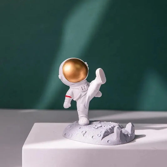 Kicking Astronaut Phone Holder - Gold