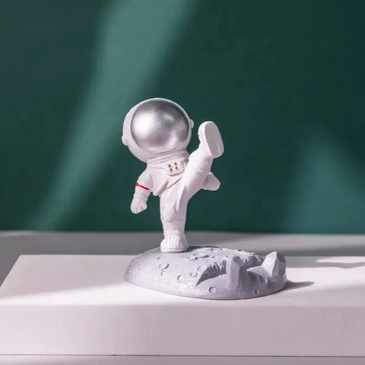 Kicking Astronaut Phone Holder - Silver